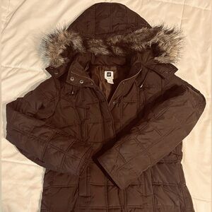 Quilted, brown coat. Fur lined hood.